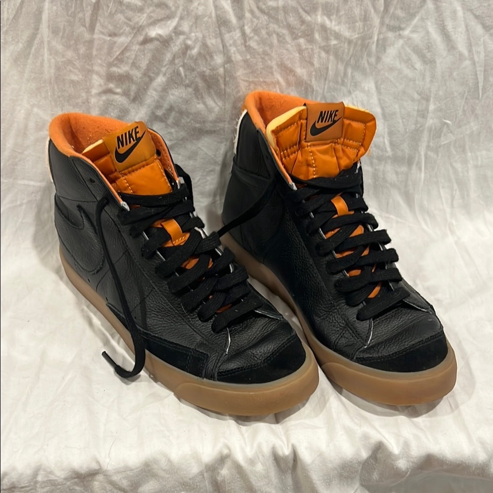 Nike Black and Orange Low-Top Sneakers with Sporty Design